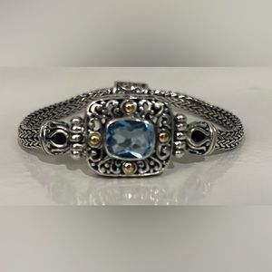 Sterling silver and blue topaz bracelet.